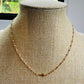 Acero-collar con cruz rosado