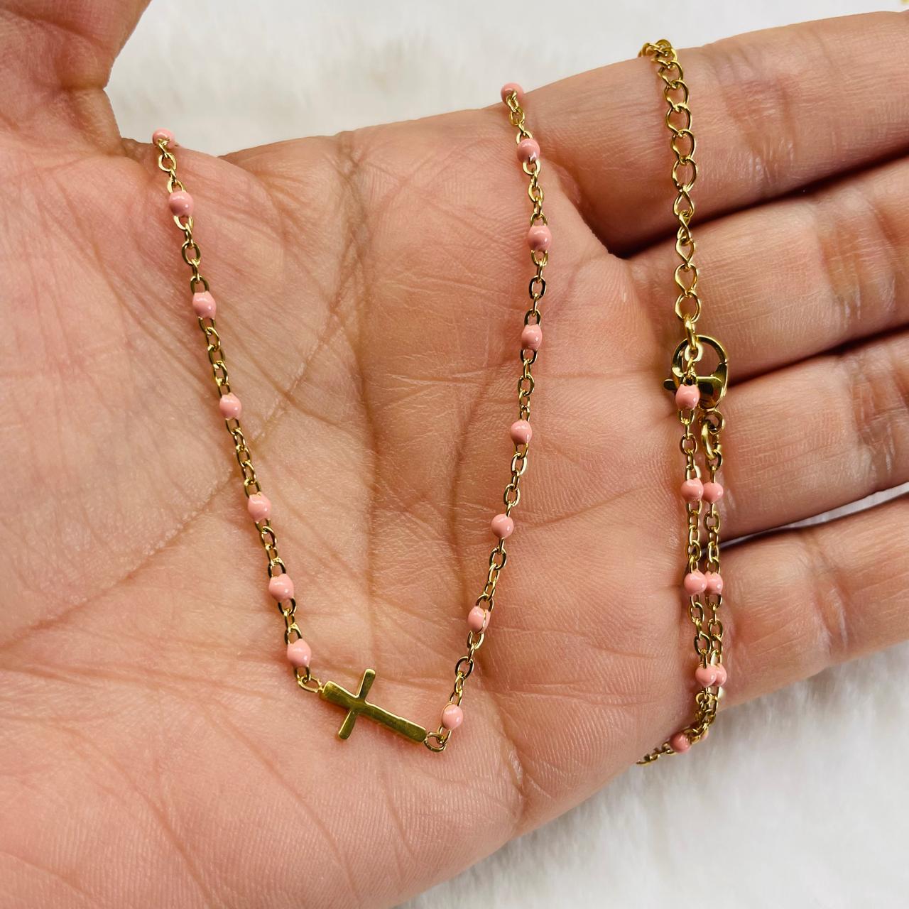 Acero-collar con cruz rosado